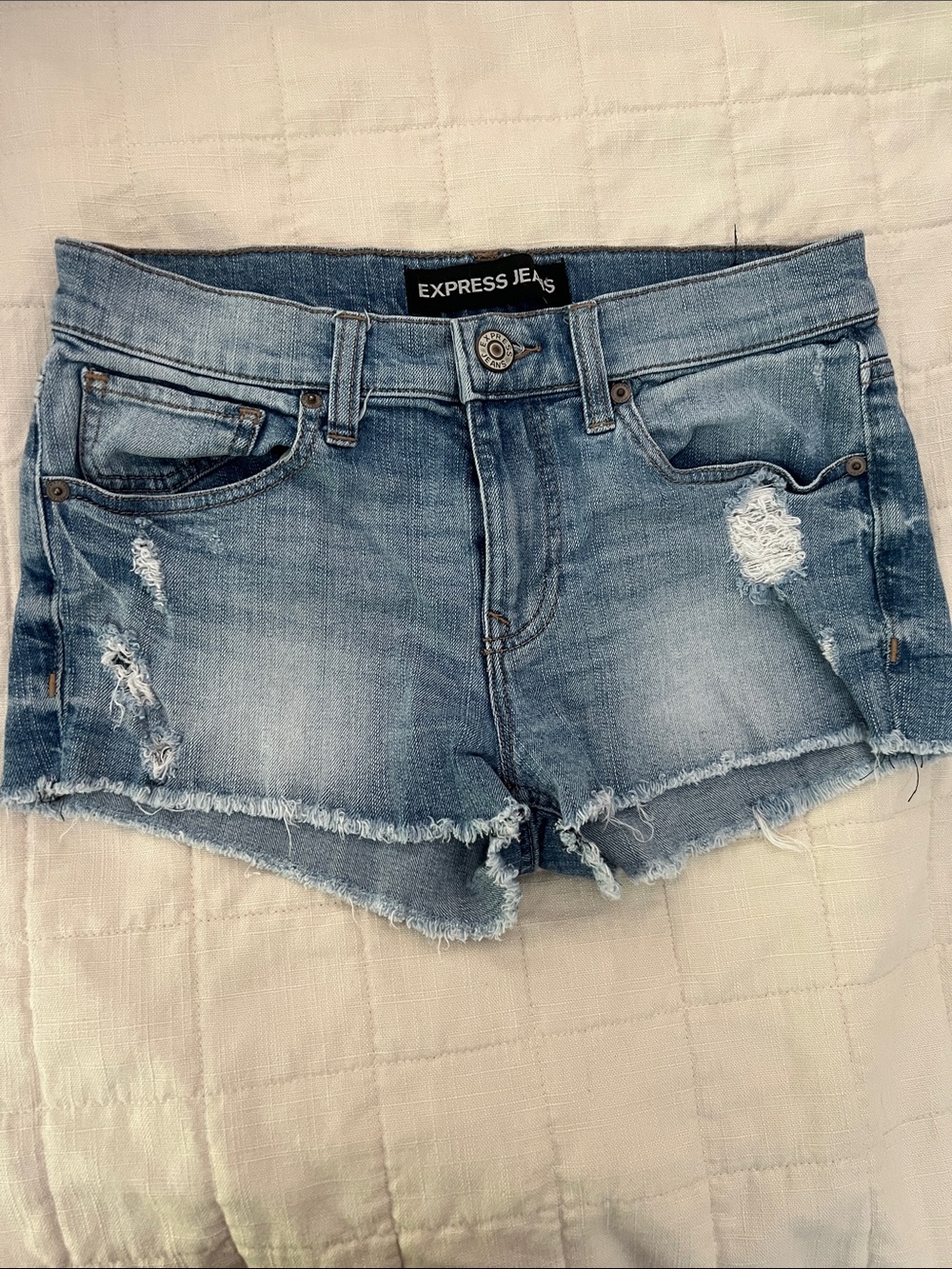 Express denim cut-off shorts.